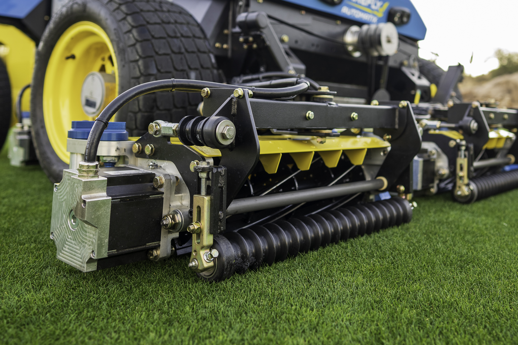 reels on AMP autonomous lawn mower
