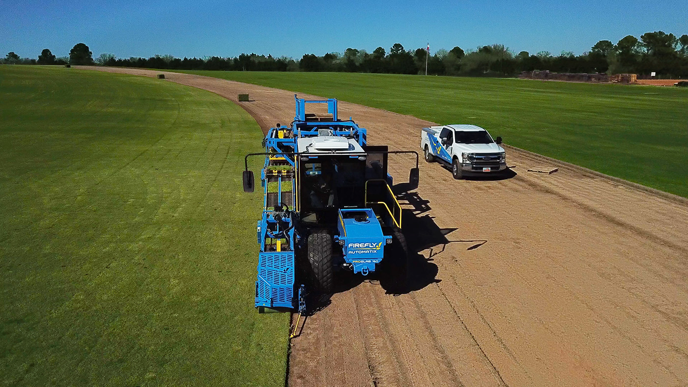FireFly service truck in field with sod harvester