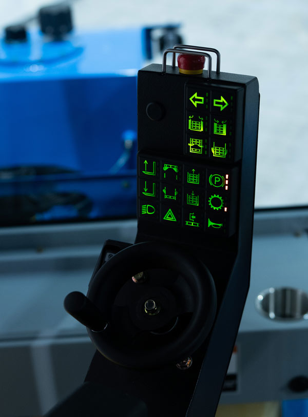 engraved and lit keypad controls inside cab of ProSlab 165 turf harvester