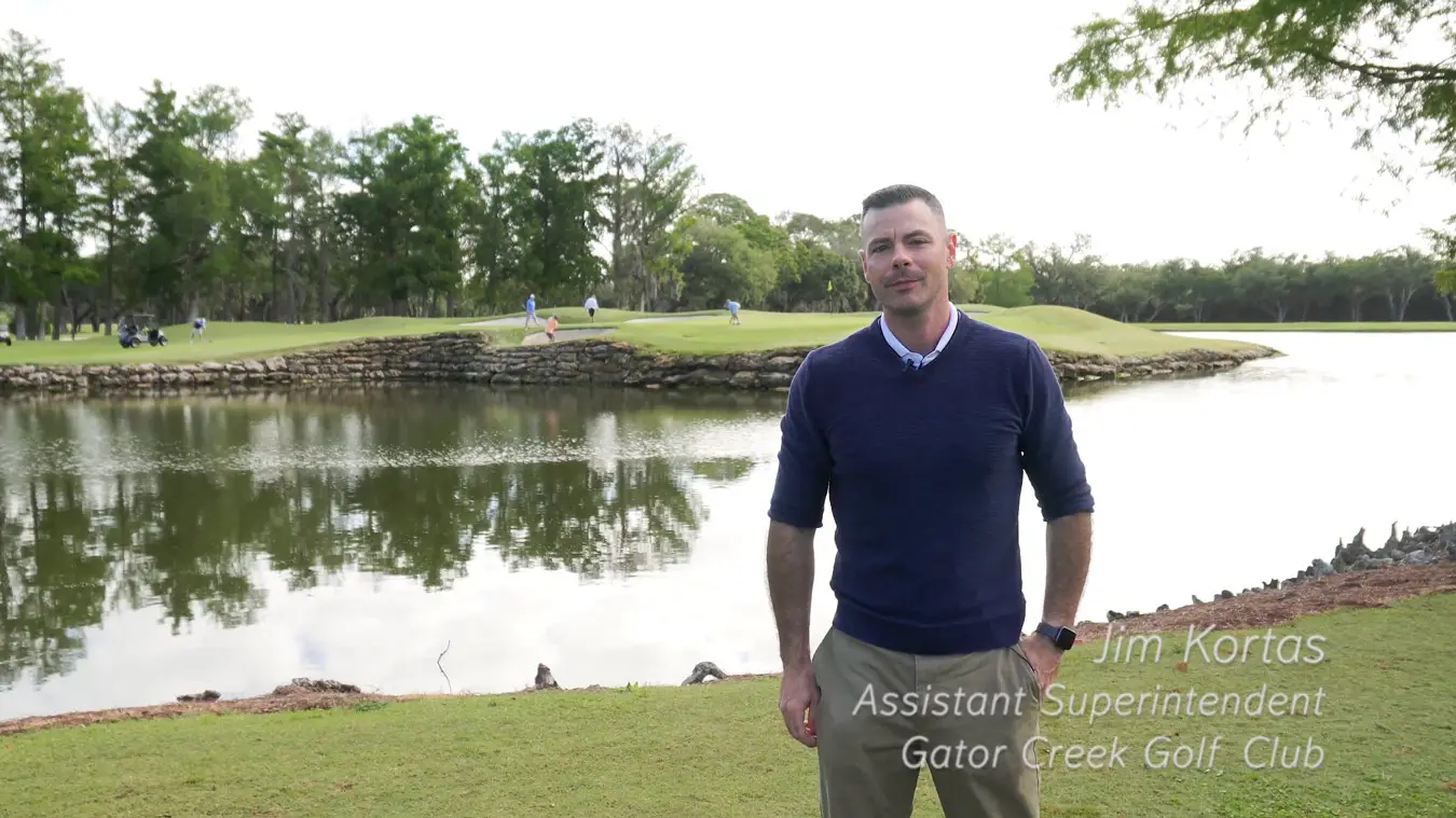 Jim Kortas assistant superintendent at Gator Creek Golf Club standing on the course